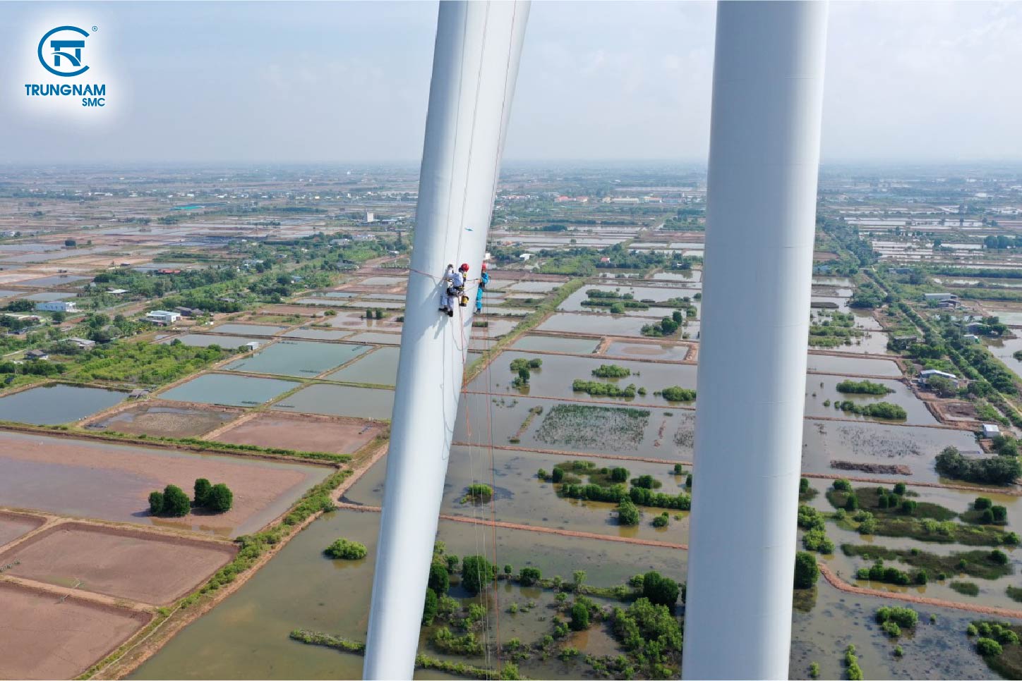 Repairing turbine blades by rope access method.